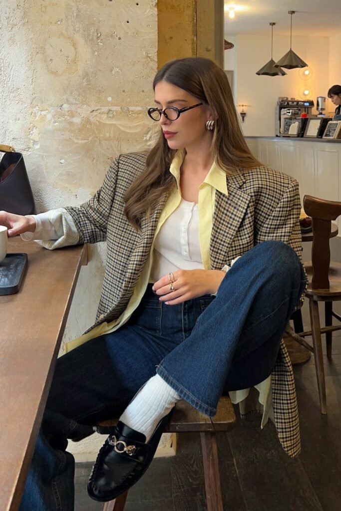 Beige Blazer + Yellow Shirt + White Top + Blue Jeans + Black Loafers