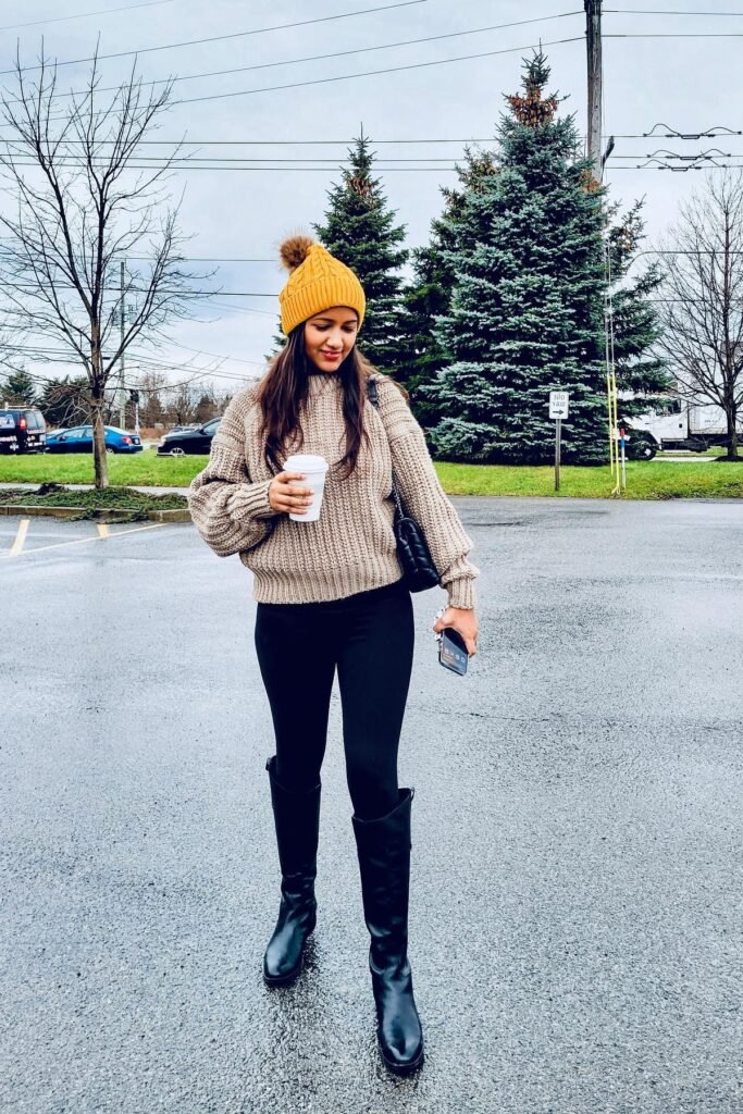 Beige Cable Knit Sweater + Black Leggings + Black Knee High Boots + Mustard Yellow Beanie