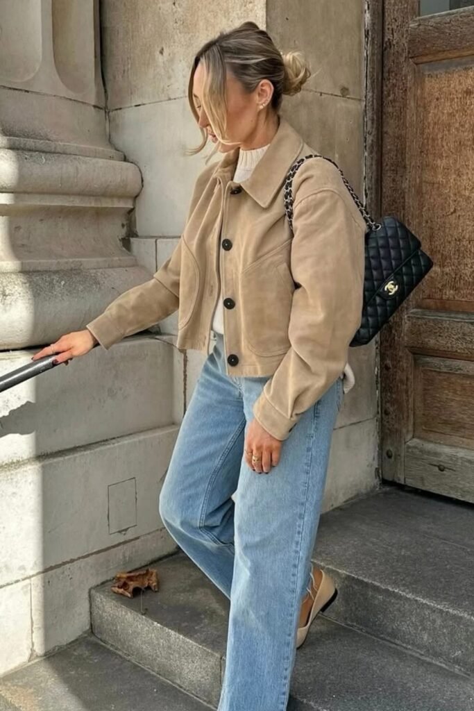 Beige Cropped Jacket + Light Wash Wide-Leg Jeans + Beige Flats + Black Chanel Bag