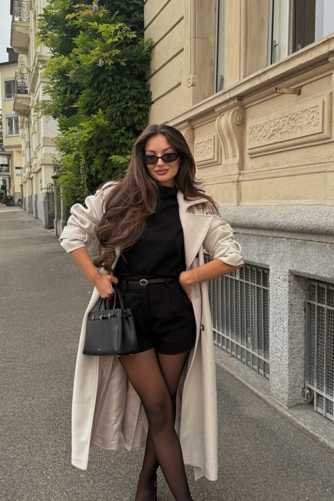 Beige Long Coat + Black Top + Black Shorts + Sheer Black Tights