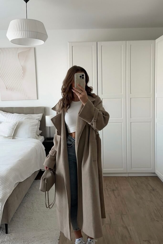 Beige Long Coat + White T-Shirt + Light Blue Jeans + White Sneakers