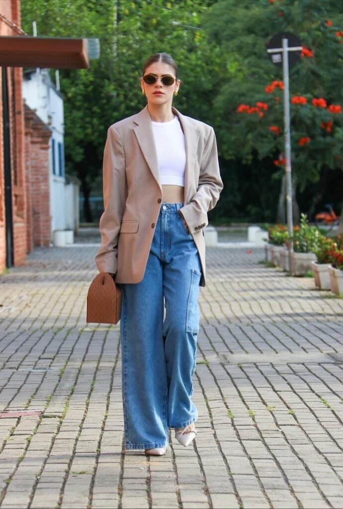Beige Oversized Blazer + White Cropped Tank + Blue Wide-Leg Jeans + Brown Structured Bag