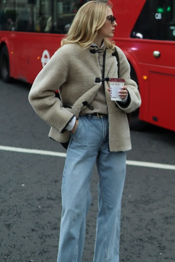 Beige Shearling Jacket + Light Blue Wide-Leg Jeans + Sunglasses