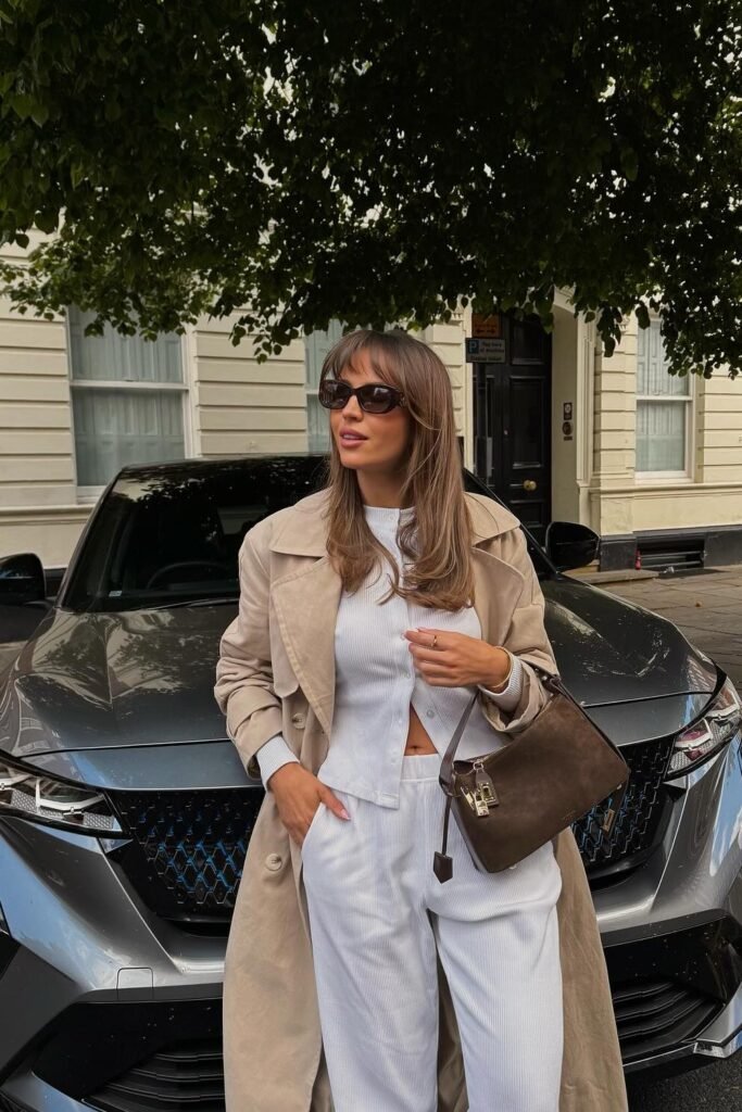 Beige Trench Coat + White Knit Twinset (Top + Pants) + Brown Structured Handbag + Oversized Sunglasses