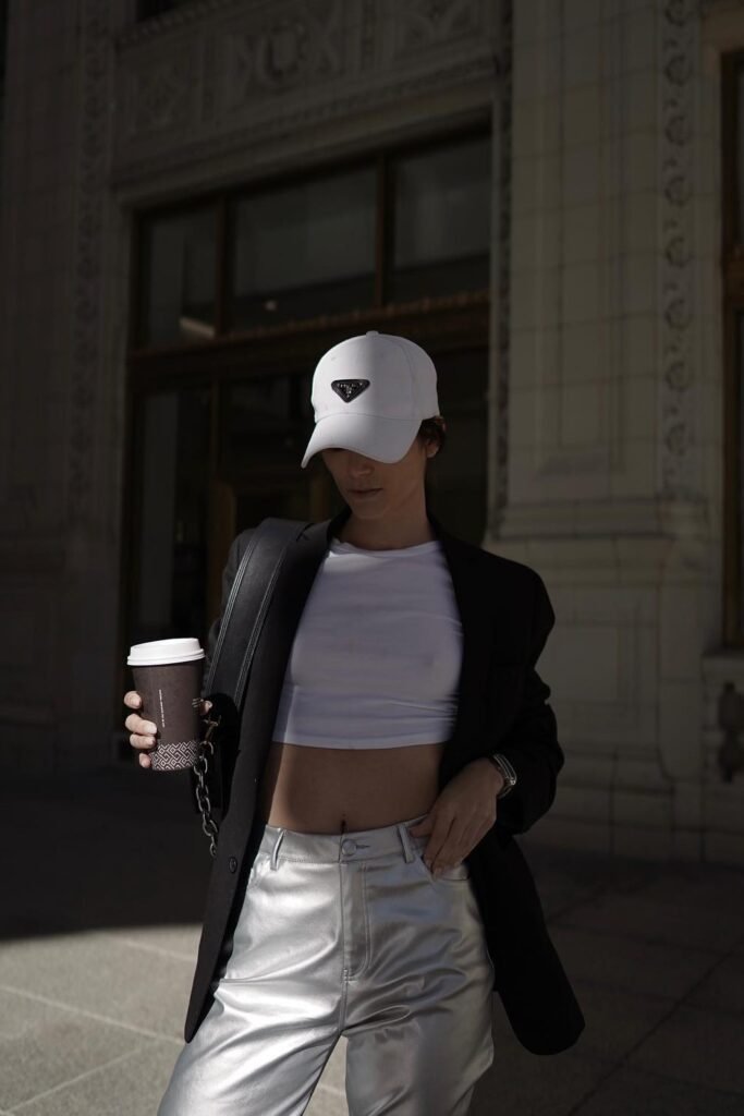 Black Blazer + White Cropped Tee + Silver Metallic Pants + White Prada Cap