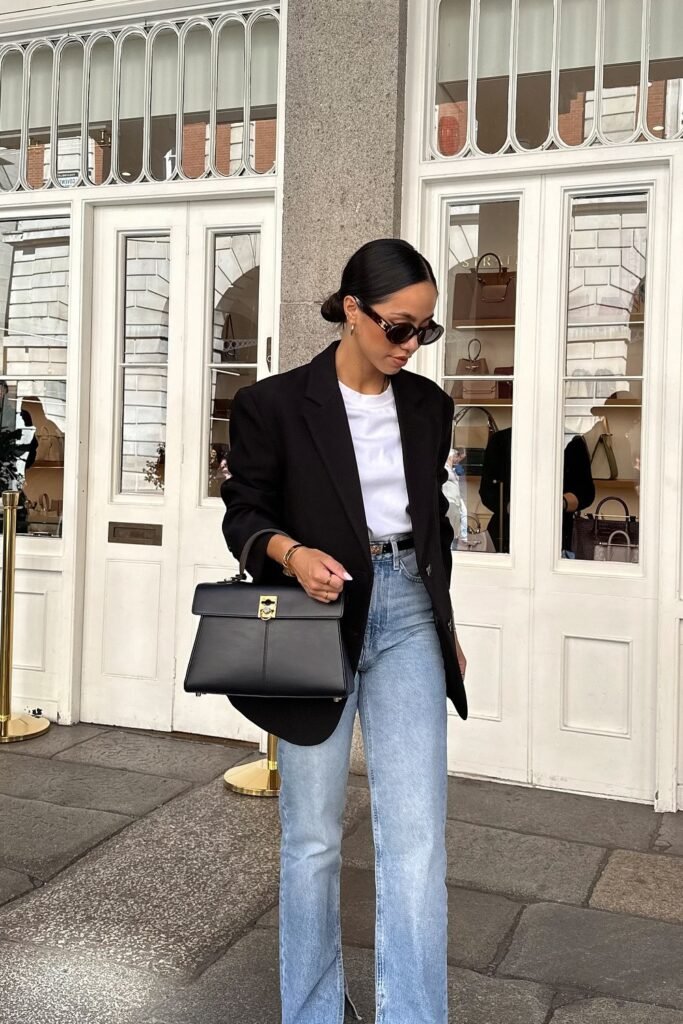 Black Blazer + White T-shirt + Light Blue Flared Jeans + Black Handbag