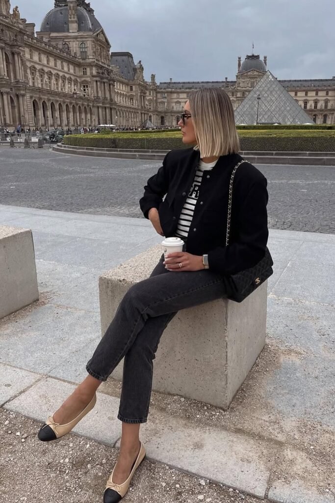 Black Cropped Jacket + Striped Top + Black Straight-Leg Jeans + Beige/Black Cap-Toe Ballet Flats + Black Quilted Chain Bag