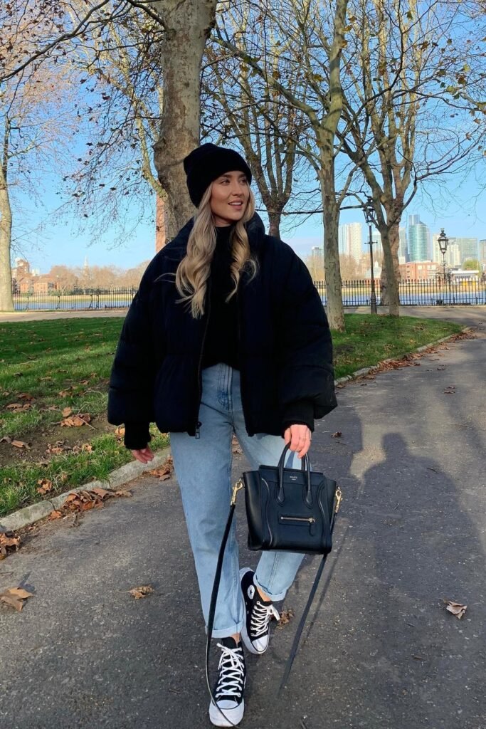 Black Cropped Puffer Jacket + Black Turtleneck + Light Blue Mom Jeans
