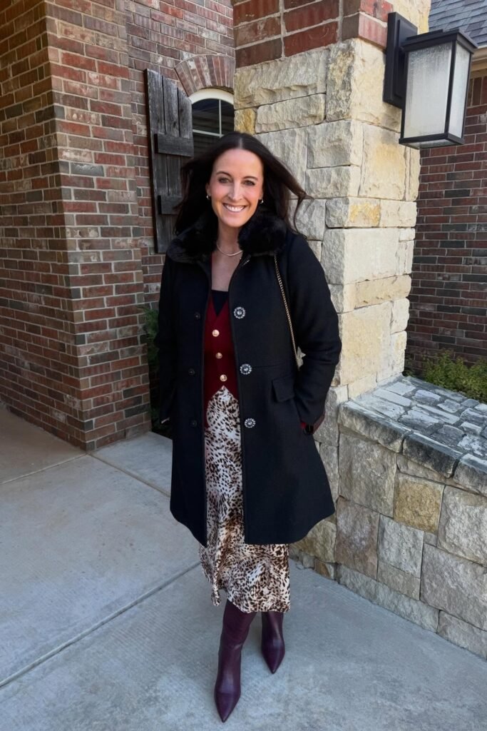 Black Faux-Fur Collar Coat + Maroon Button-Down Vest + Leopard Print Satin Skirt + Deep Plum Pointed-Toe Boots