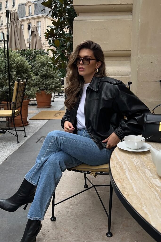 Black Leather Jacket + White T-shirt + Blue Jeans + Black Handbag + Sunglasses