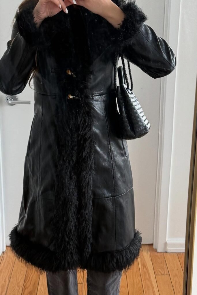 Black Leather Shearling-Trim Coat + Grey Straight Jeans + Black Woven Chain Bag