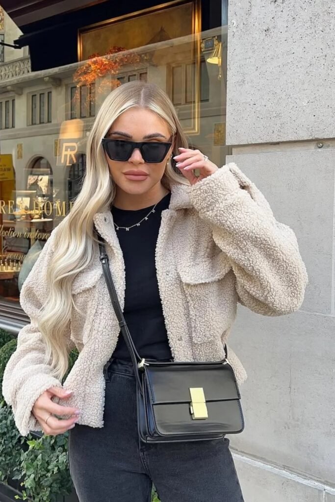 Black Tee + Beige Teddy Jacket + Black Jeans + Black Crossbody Bag + Sunglasses