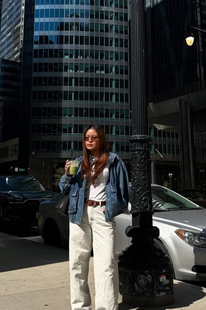 Blue Oversized Denim Jacket + White Tee + White Wide-Leg Jeans + Brown Belt + Black Tote Bag