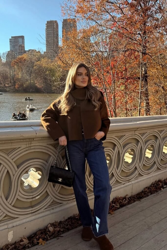 Brown Cropped Jacket + Dark Blue Straight Jeans + Brown Uggs + Black Chanel Bag