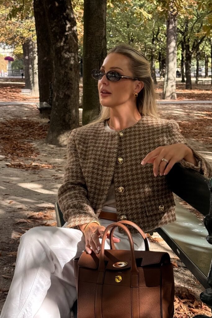 Brown Houndstooth Cropped Jacket + White Trousers + Neutral Top + Brown Structured Tote Bag + Oval Sunglasses