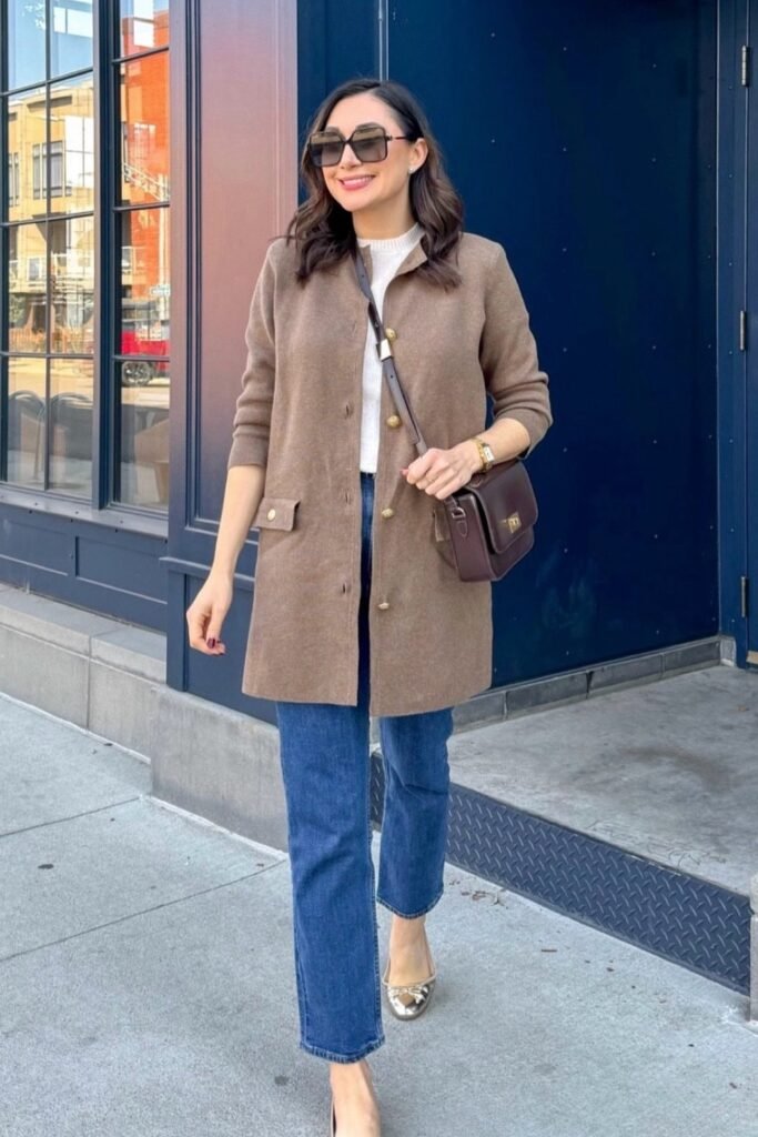 Brown Long Cardigan + White Sweater + Blue Straight Jeans + Gold-Toe Flats + Brown Crossbody Bag