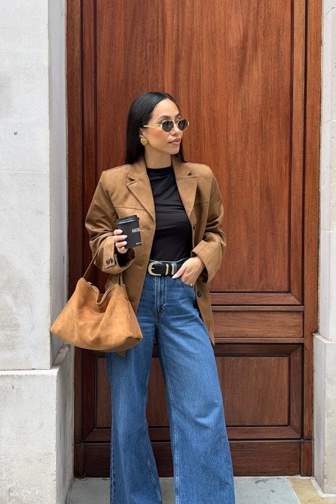 Brown Suede Blazer + Black T-Shirt + Blue Wide-Legged Jeans + Tan Bag