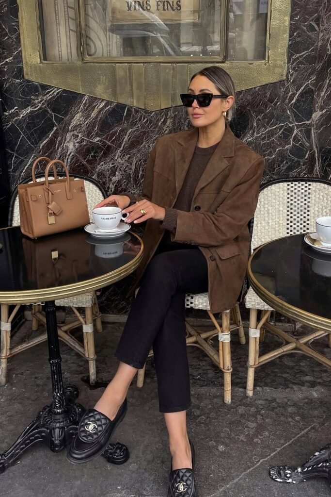 Brown Suede Blazer + Dark Brown Knit Sweater + Black Cropped Trousers + Black Chanel Loafers + Tan Structured Handbag