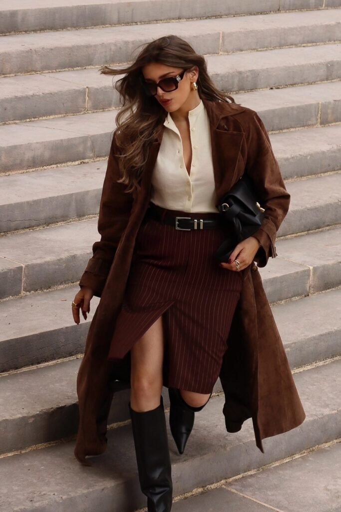Brown Suede Trench Coat + Cream Shirt + Pinstripe Skirt + Black Knee-High Boots