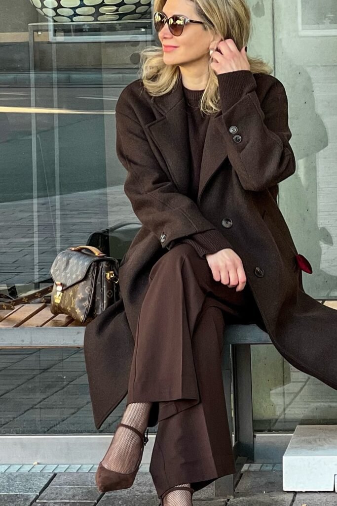 Brown Sweater + Brown Wide-Leg Pants + Long Brown Coat + Brown Heels + Brown Monogram Handbag