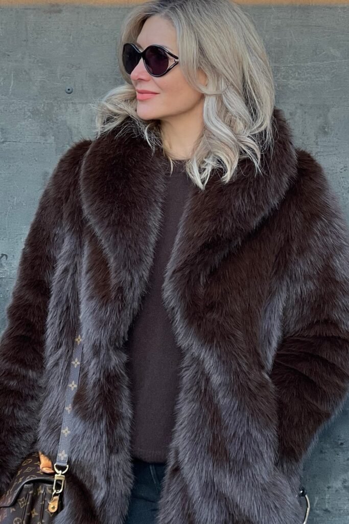 Brown Sweater + Long Brown Fur Coat + Black Pants + Brown Monogram Crossbody Bag