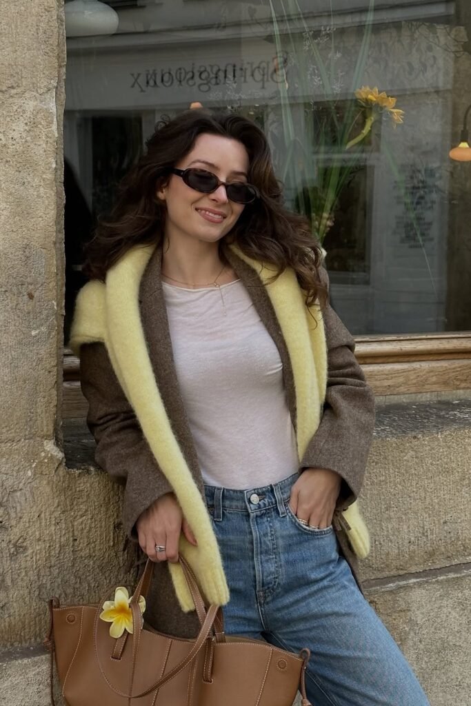 Brown Wool Coat with Yellow Scarf Detail + White T-Shirt + Blue Jeans + Brown Tote Bag + Sunglasses