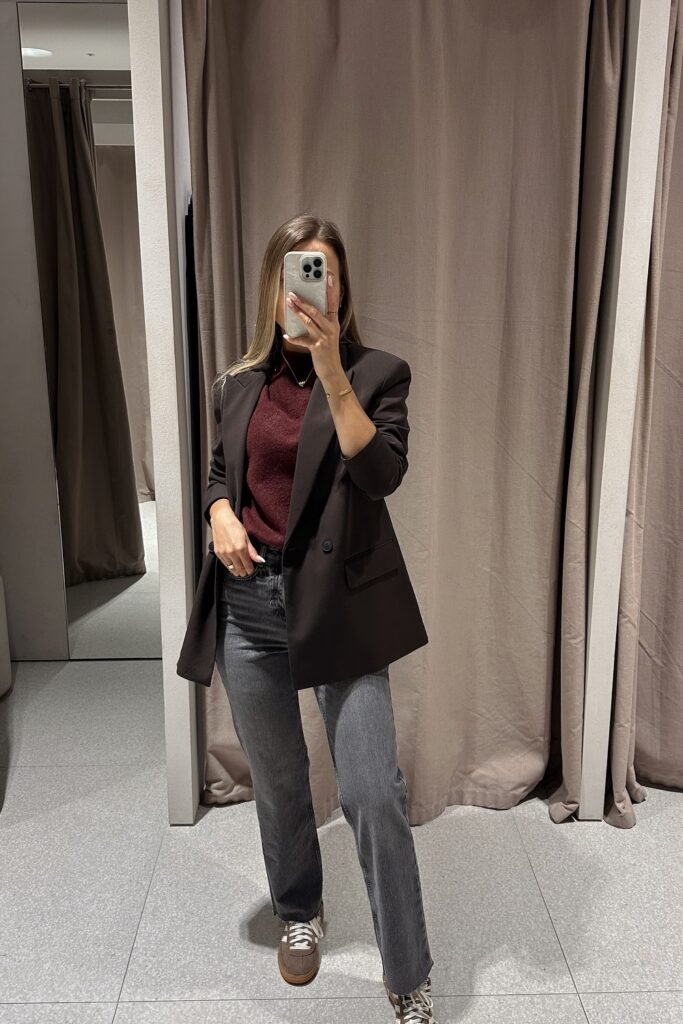 Burgundy Knit Top + Black Oversized Blazer + Grey Straight Jeans + Brown Sneakers