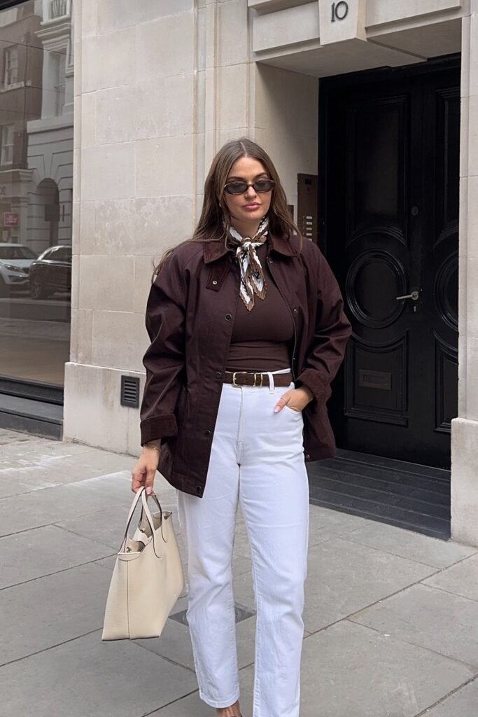 Burgundy Overshirt Jacket + Brown Top + White Straight Jeans + Brown Belt + Brown Printed Scarf + White Structured Handbag + Sunglasses