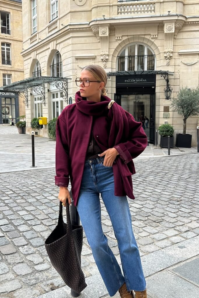 Burgundy Wool Coat + Burgundy Scarf + Brown Top + Blue Straight-Leg Jeans + Brown Ankle Boots + Woven Tote Bag
