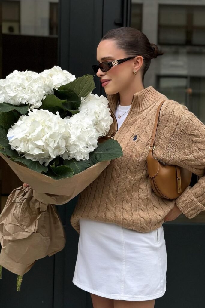 Camel Cable Knit Sweater + White Mini Skirt + White Tee + Brown Dior Saddle Bag
