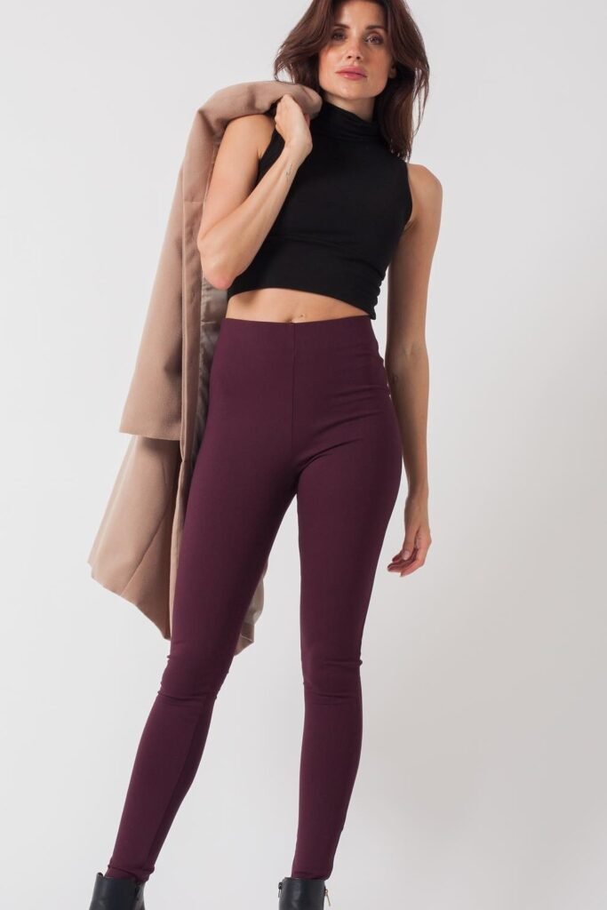 Camel Coat (draped) + Black Sleeveless Turtleneck Crop + Burgundy Skinny Pants + Black Ankle Boots
