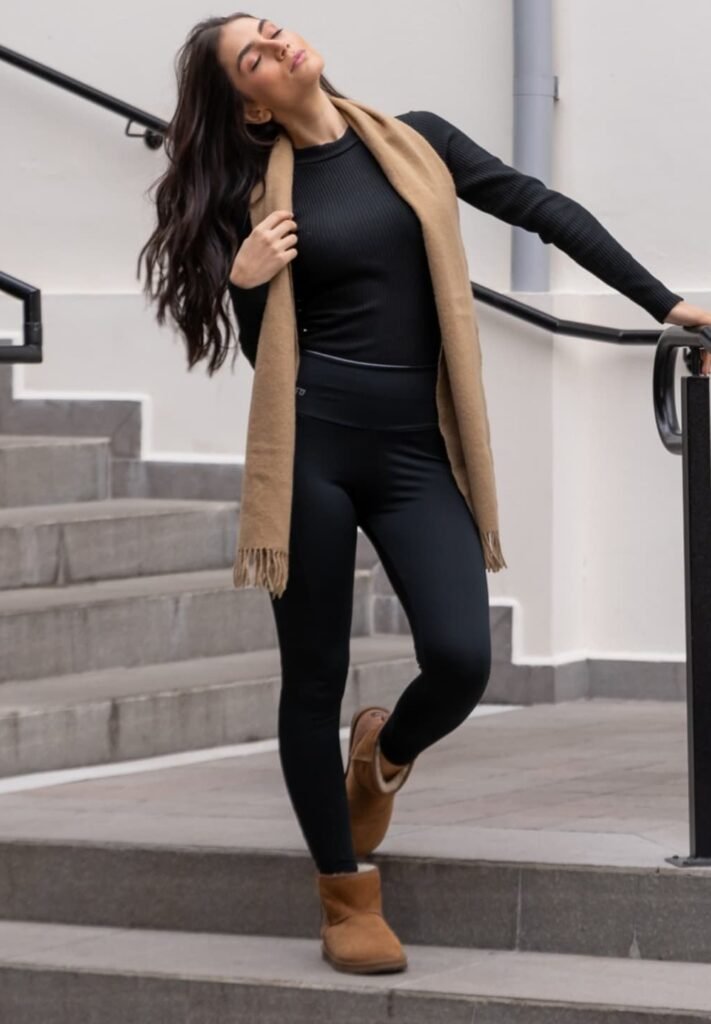 Camel Scarf + Black Ribbed Long-Sleeve Top + Black Leggings + Tan Ugg Boots