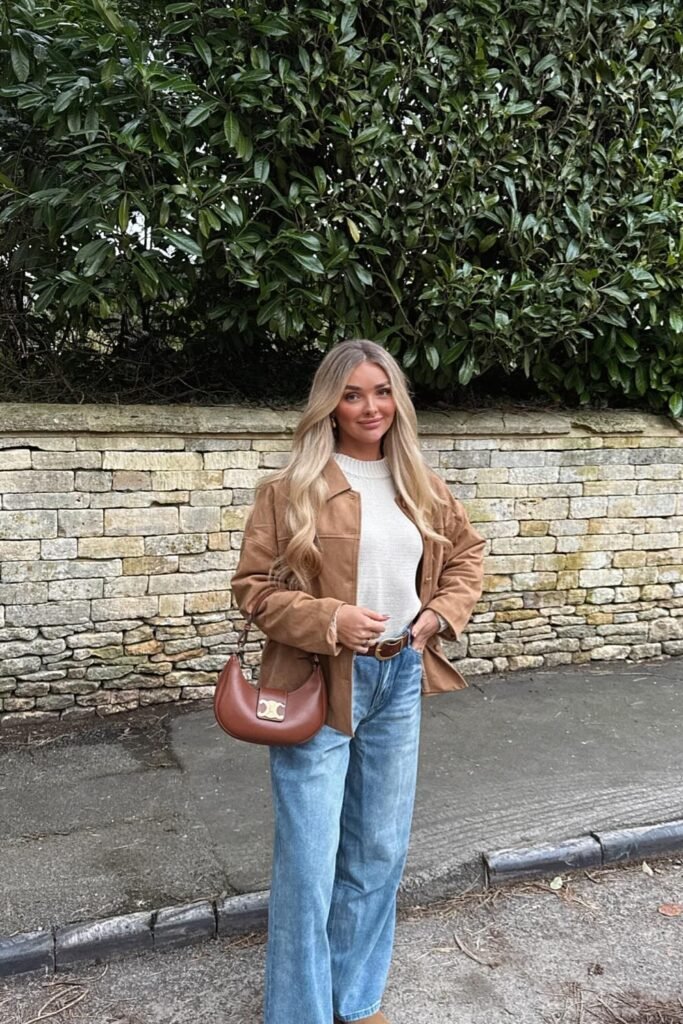 Camel Suede Jacket + White Knit Sweater + Blue Wide-Leg Jeans + Brown Leather Belt + Brown Shoulder Bag