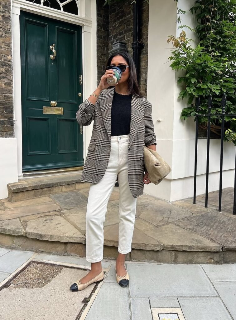 Checked Oversized Blazer + Black Knit Top + White Cropped Jeans + Beige Clutch Bag + Two-Tone Ballet Flats
