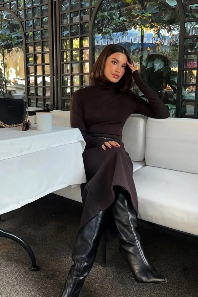 Chocolate Brown Knit Turtleneck Dress + Black Knee-High Boots + Black Shoulder Bag