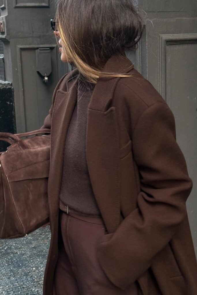 Chocolate Wool Coat + Brown Knit Sweater + Brown Tailored Trousers + Brown Suede Tote + Sunglasses