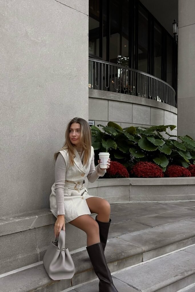 Cream Double-Breasted Mini Dress + Beige Ribbed Knit Top + Black Knee-High Boots + Grey Tote