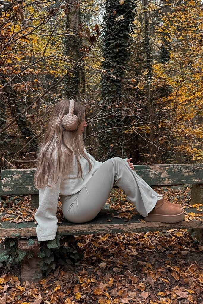 Cream Fuzzy Sweater + Beige Flared Pants + Chestnut Ugg Platform Boots + Beige Ear Muffs