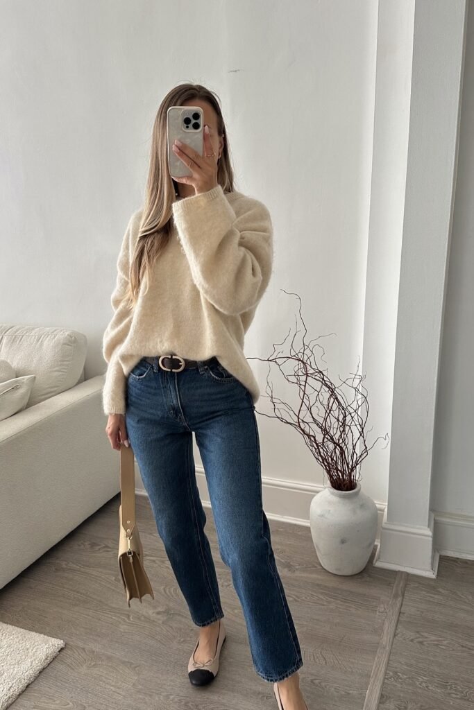 Cream Oversized Sweater + Dark Blue Straight Jeans + Black Flats + Beige Shoulder Bag