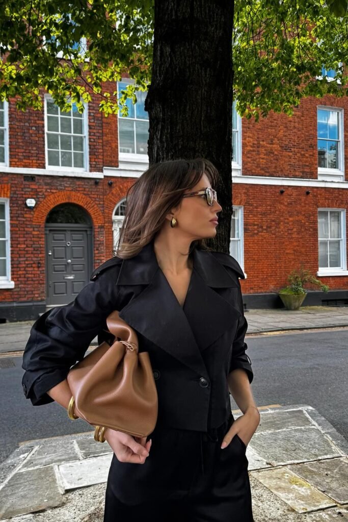 Cropped Black Trench Jacket + Black Wide-Leg Pants + Brown Slouchy Tote Bag
