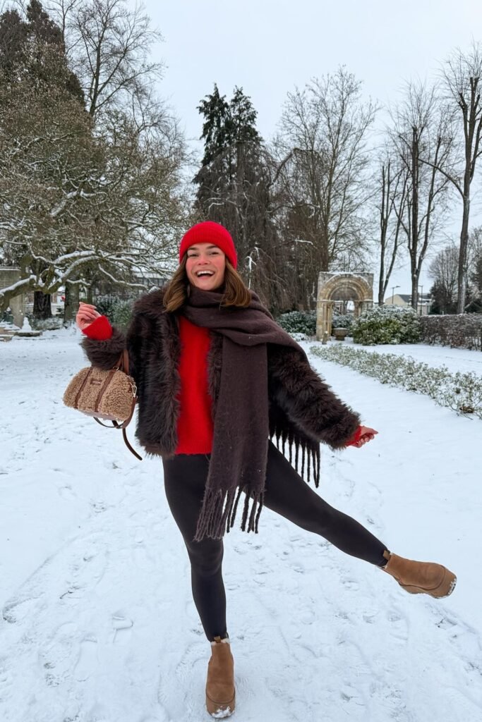 Dark Brown Faux Fur Jacket + Red Sweater + Black Leggings + Tan Platform Boots + Red Beanie