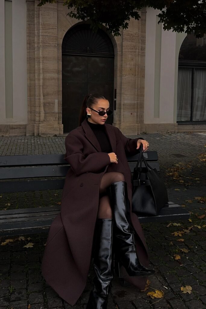 Dark Brown Oversized Coat + Black Turtleneck Dress + Black Knee-High Leather Boots + Black Tote Bag