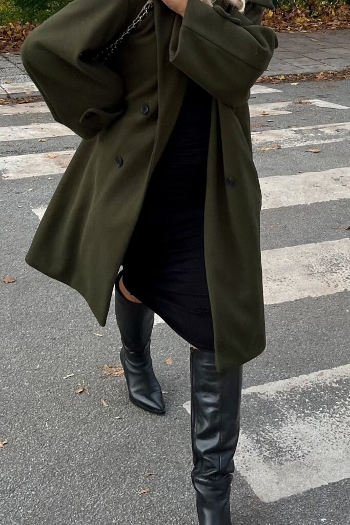 Dark Green Long Coat + Black Bodycon Dress + Black Knee-High Boots + Black Shoulder Bag