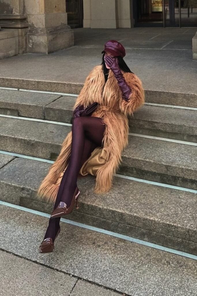 Faux Fur Camel Coat + Burgundy Accessories + Sheer Black Tights + Burgundy Heels