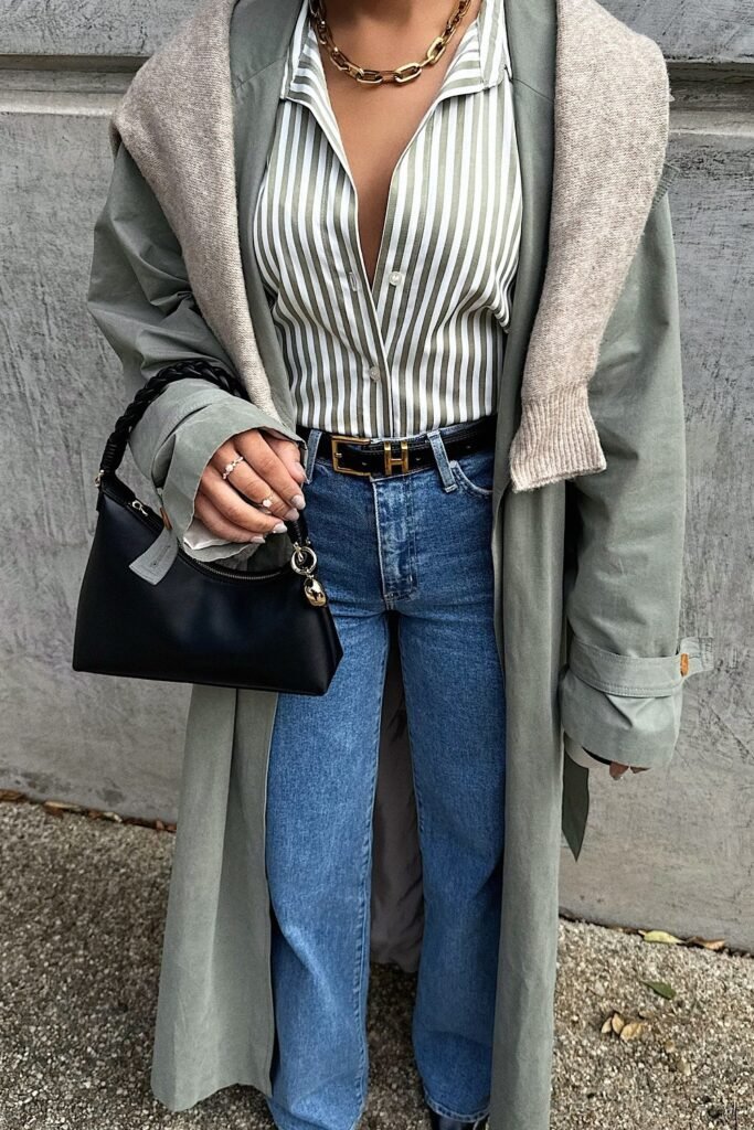 Green Striped Button-Up Shirt + Grey Long Coat + Blue Jeans + Black Shoulder Bag