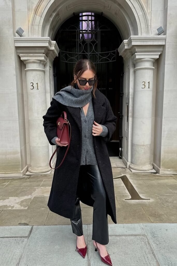Grey Cardigan + Black Oversized Coat + Grey Scarf + Black Leather Pants + Burgundy Heels + Burgundy Structured Bag + Sunglasses