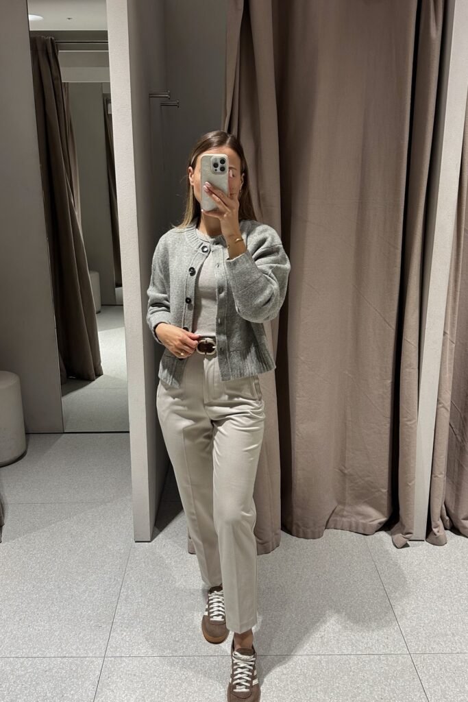 Grey Cardigan + Grey Fitted Top + Light Beige Trousers + Brown Sneakers + Brown Belt