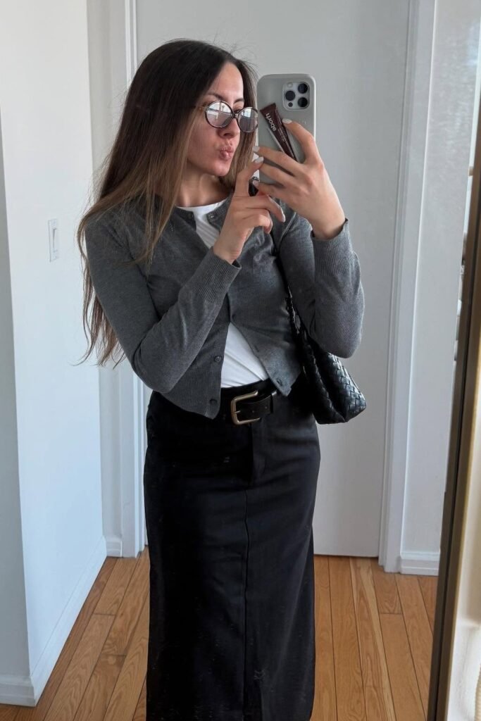 Grey Cardigan + White Tee + Black Midi Pencil Skirt + Black Belt + Black Woven Shoulder Bag + Round Glasses