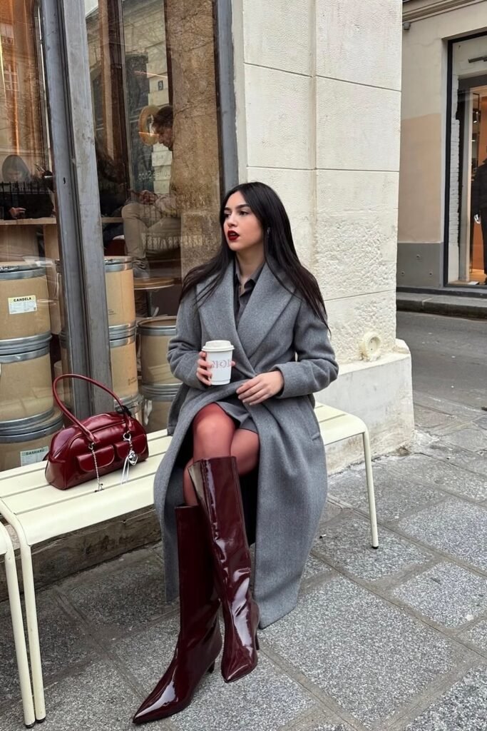 Grey Coat + Black Patent Leather Boots + Burgundy Handbag + White Cup