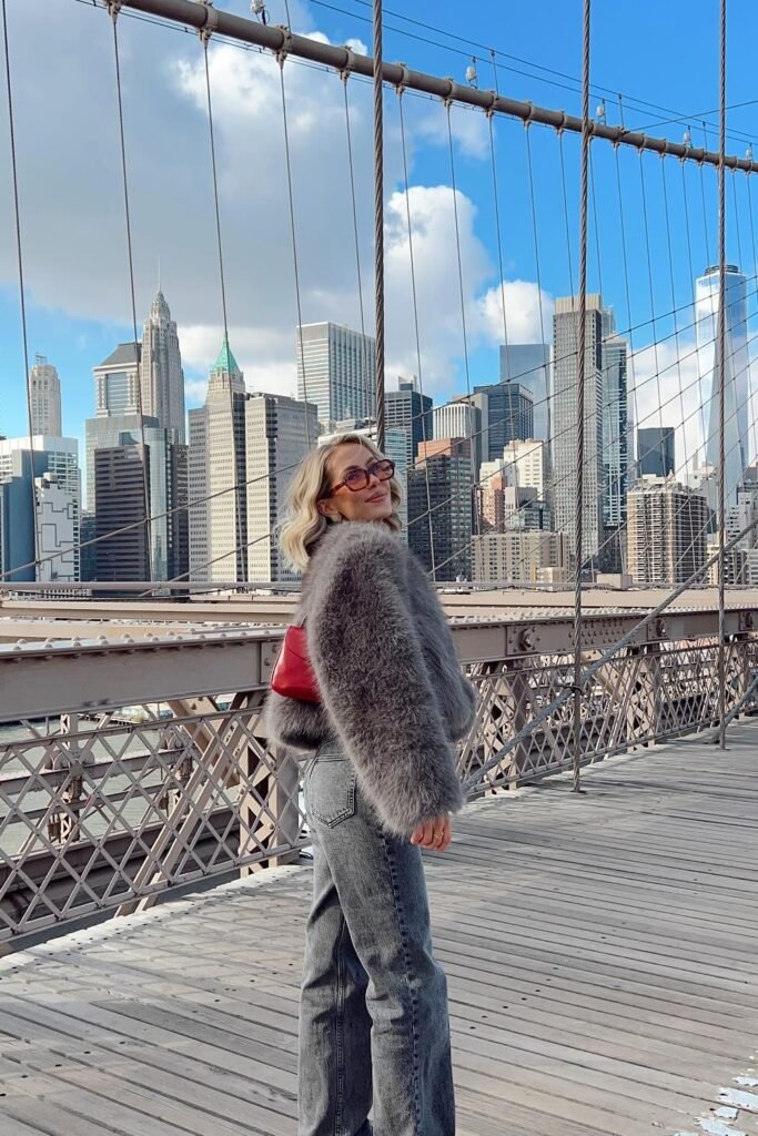 Grey Faux Fur Jacket + Grey Washed Jeans + Red Quilted Shoulder Bag + Sunglasses